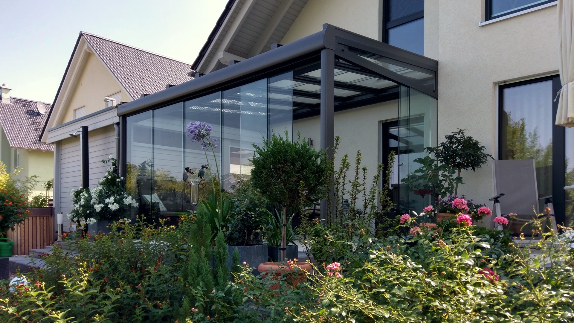 Glasschiebedach mit Glasschiebewänden für komplette Öffnung